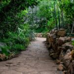 Sone path with rock retaining wall