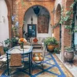 Rustic Tile Patio With Dining Table