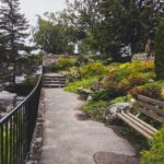 Paver path with fence retaining wall and benches