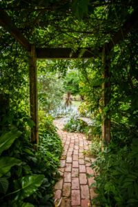Archway covered stone walkway