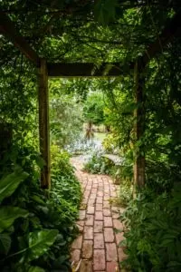 Archway covered stone walkway
