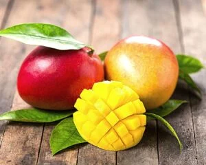 cut-mango-on-wood Mango Cut and displayed on wood board