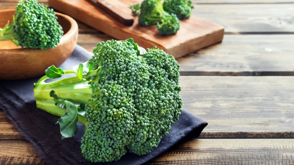 fresh broccoli on a cutting board