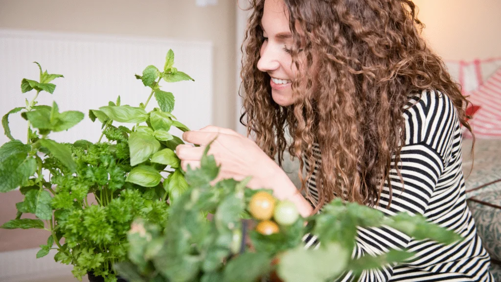 girl enjoying indoor garden girl enjoying indoor garden