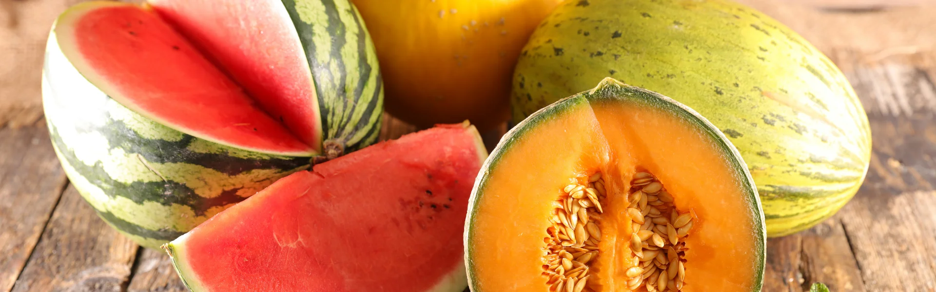 variety of cut melons